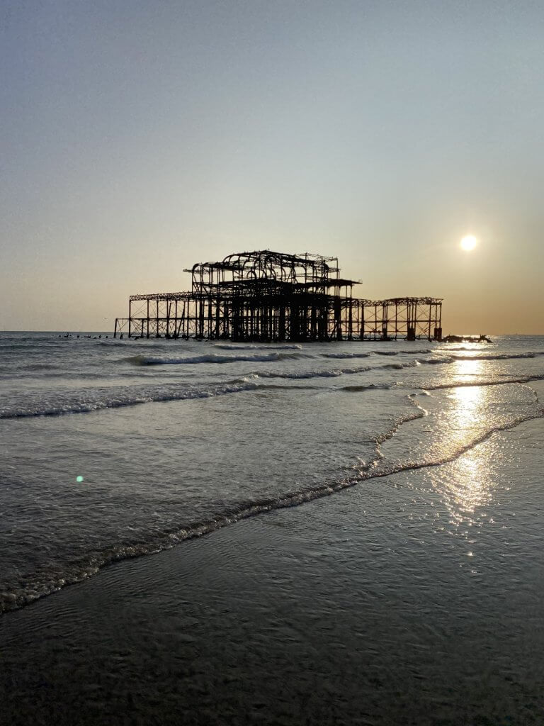 West Pier in Hove at sunset during low tide